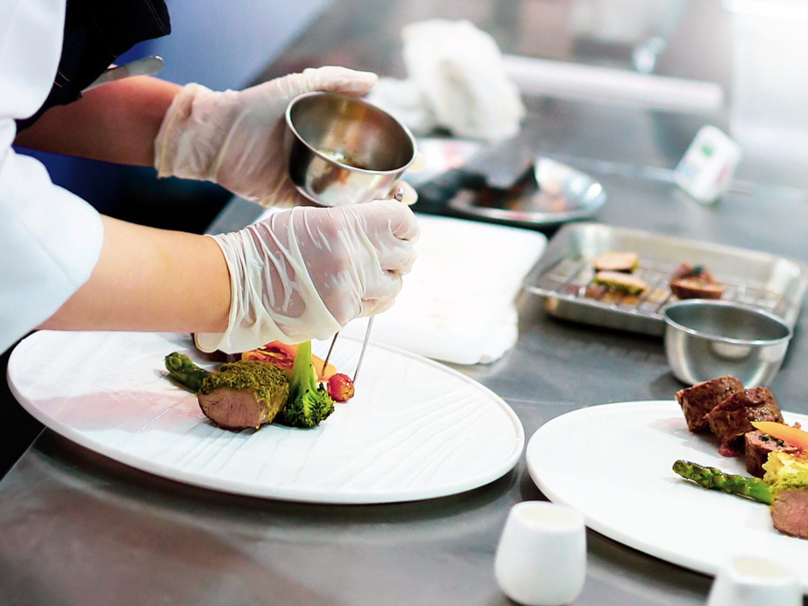 Chef preparing food, meal, in the kitchen, chef cooking, Chef decorating dish, closeup