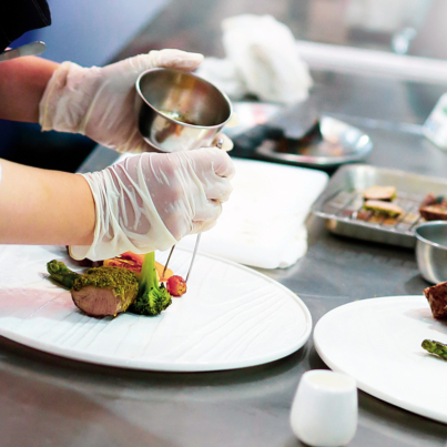 Chef preparing food, meal, in the kitchen, chef cooking, Chef decorating dish, closeup