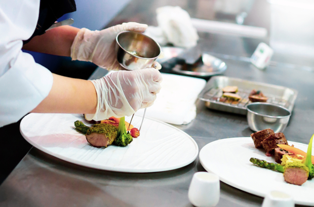 Chef preparing food, meal, in the kitchen, chef cooking, Chef decorating dish, closeup